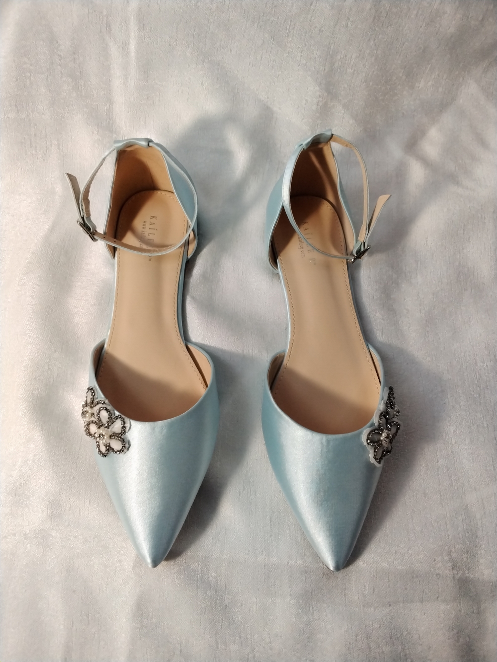 Kailee P Pointed Light Blue Ankle-Strap Flats with Crystal Flower Accent
